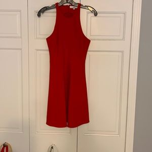 Likely red dress, size 6. Fit and flare style; length is around mid-thigh.
